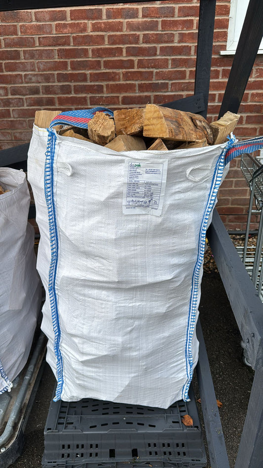 Barrow Bag of hardwood Logs (Delivery within 12 miles of Minshull's).